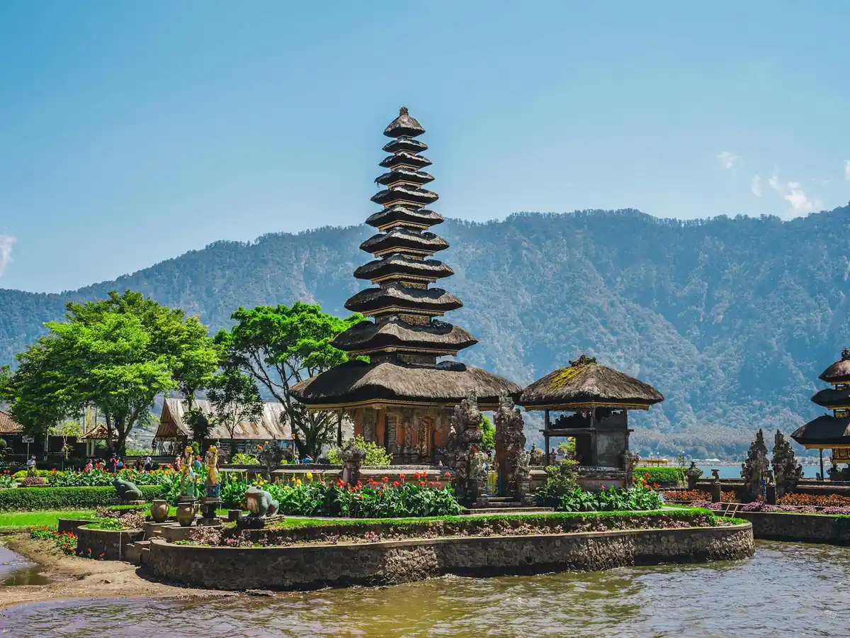 Pura Ulun Danu Bratan temple on the lake, with mountains behind